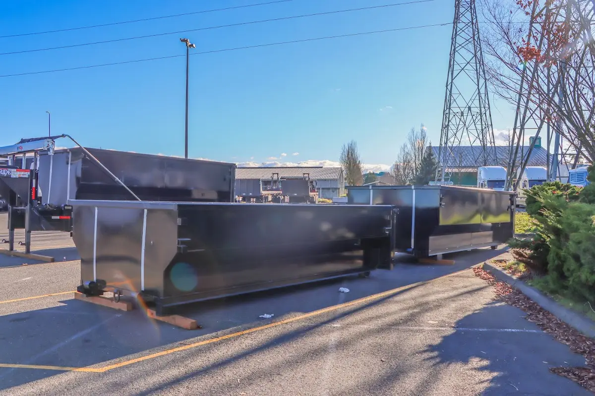 Roll-off dumpster ready for waste disposal at job site for 2 Yard Dumpster Rental in Ankeny